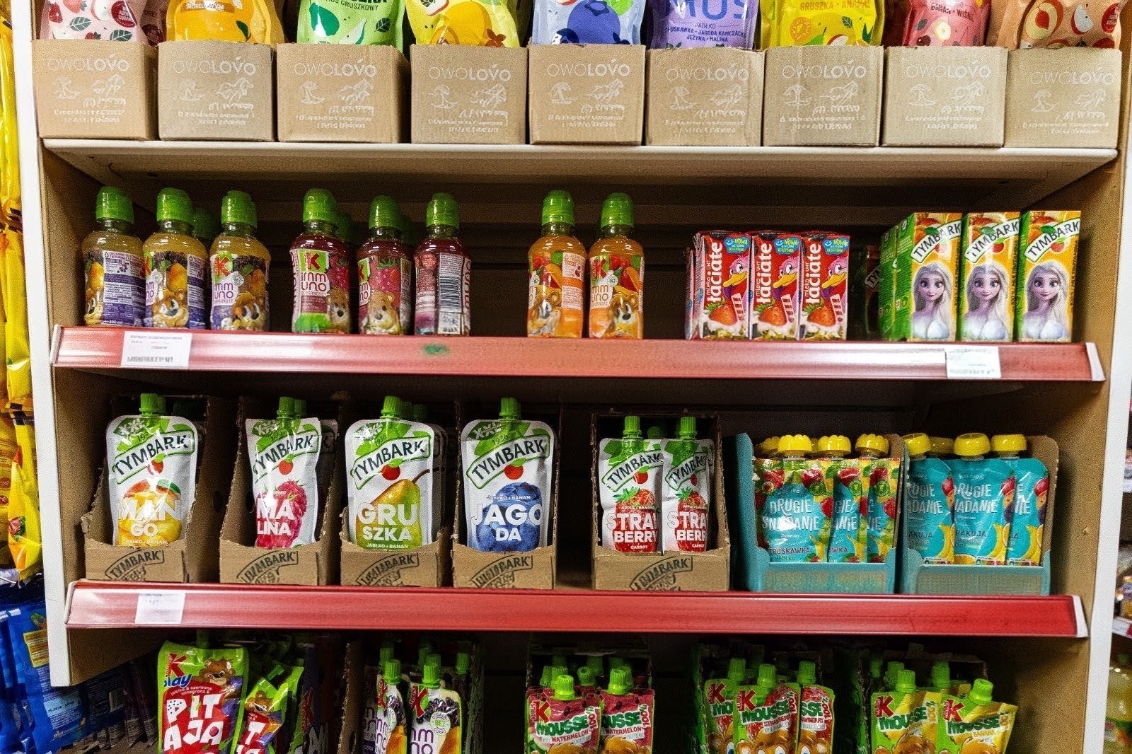 Polish soft drinks, Tymbark juices and fruit pouches on the shelves 2
